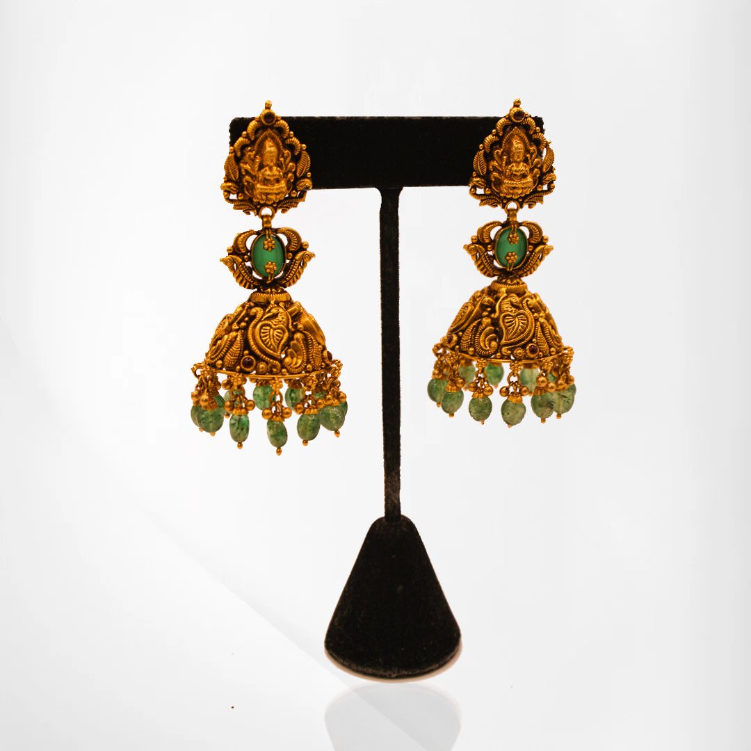 Temple-Inspired Lakshmi Earrings with Green Gemstone Accents