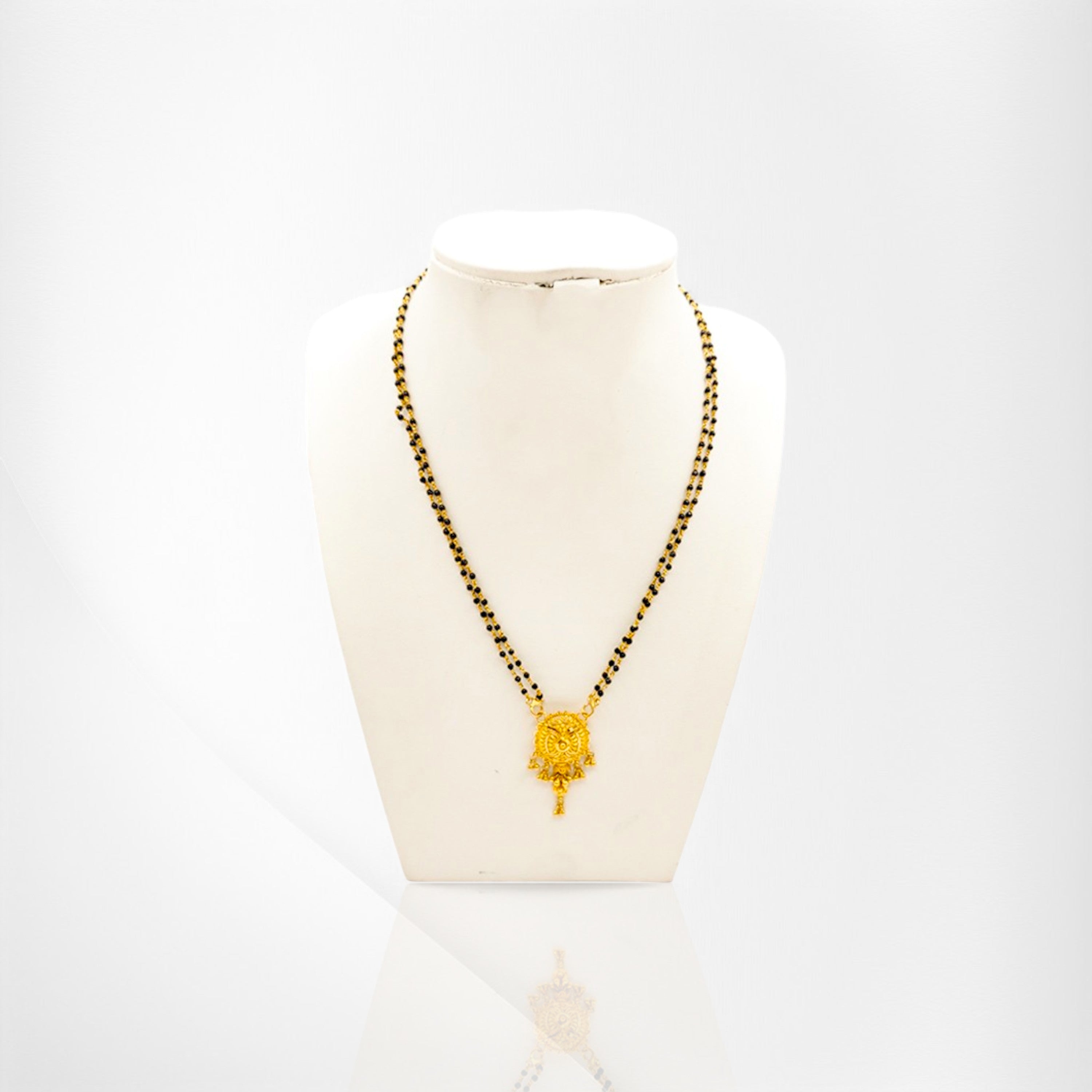 Gold Mangalsutra with Intricate Detailing