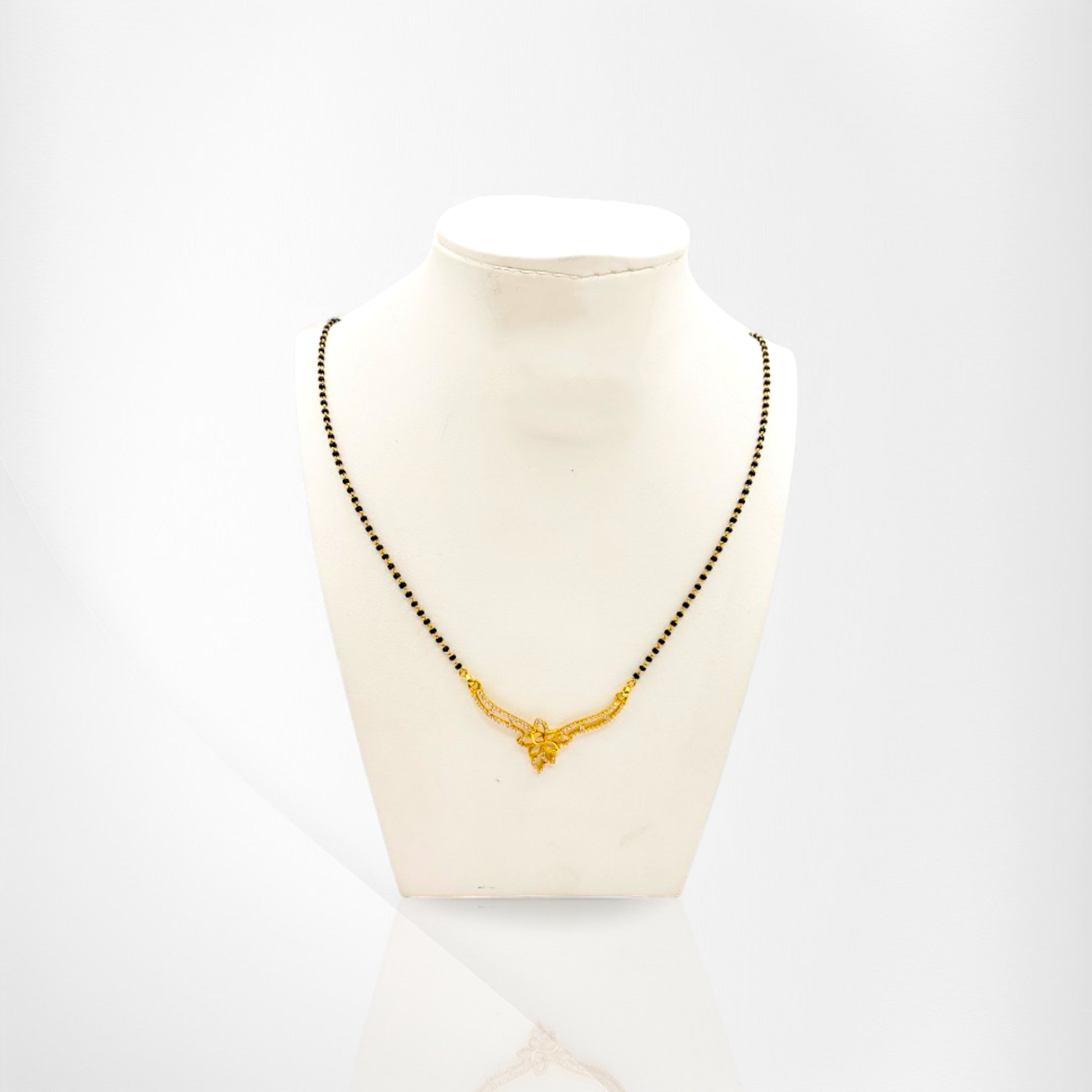 Elegant Mangalsutra with Gold Detailing and Floral Design