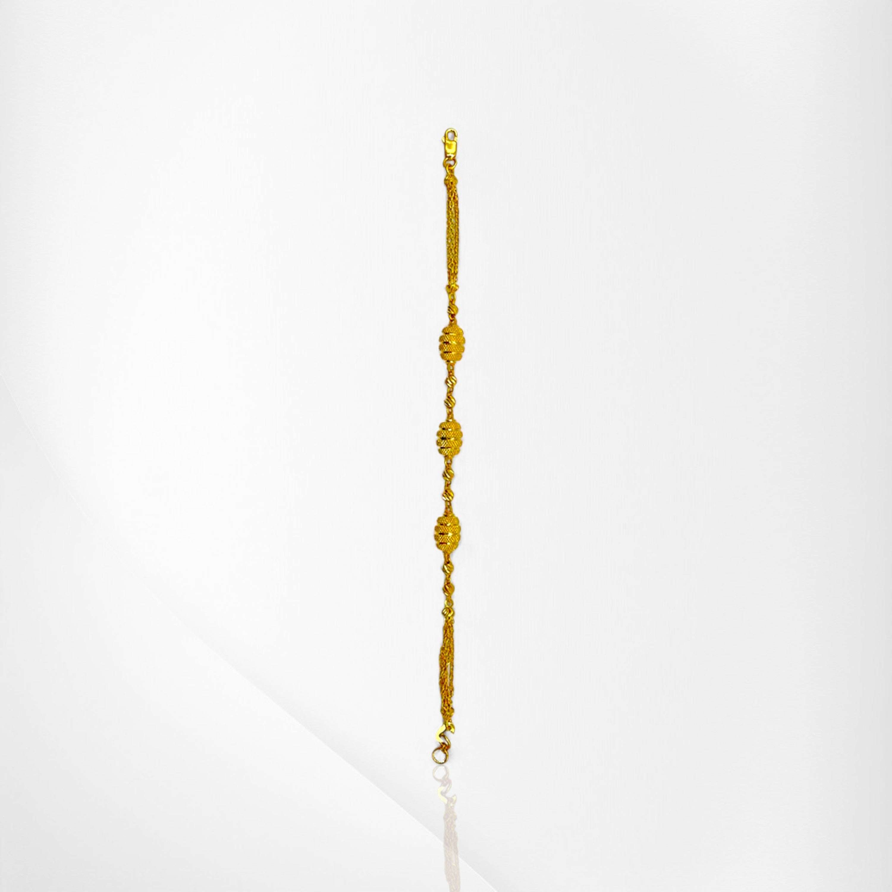 Layered Yellow Gold Bracelet with Beaded Elegance