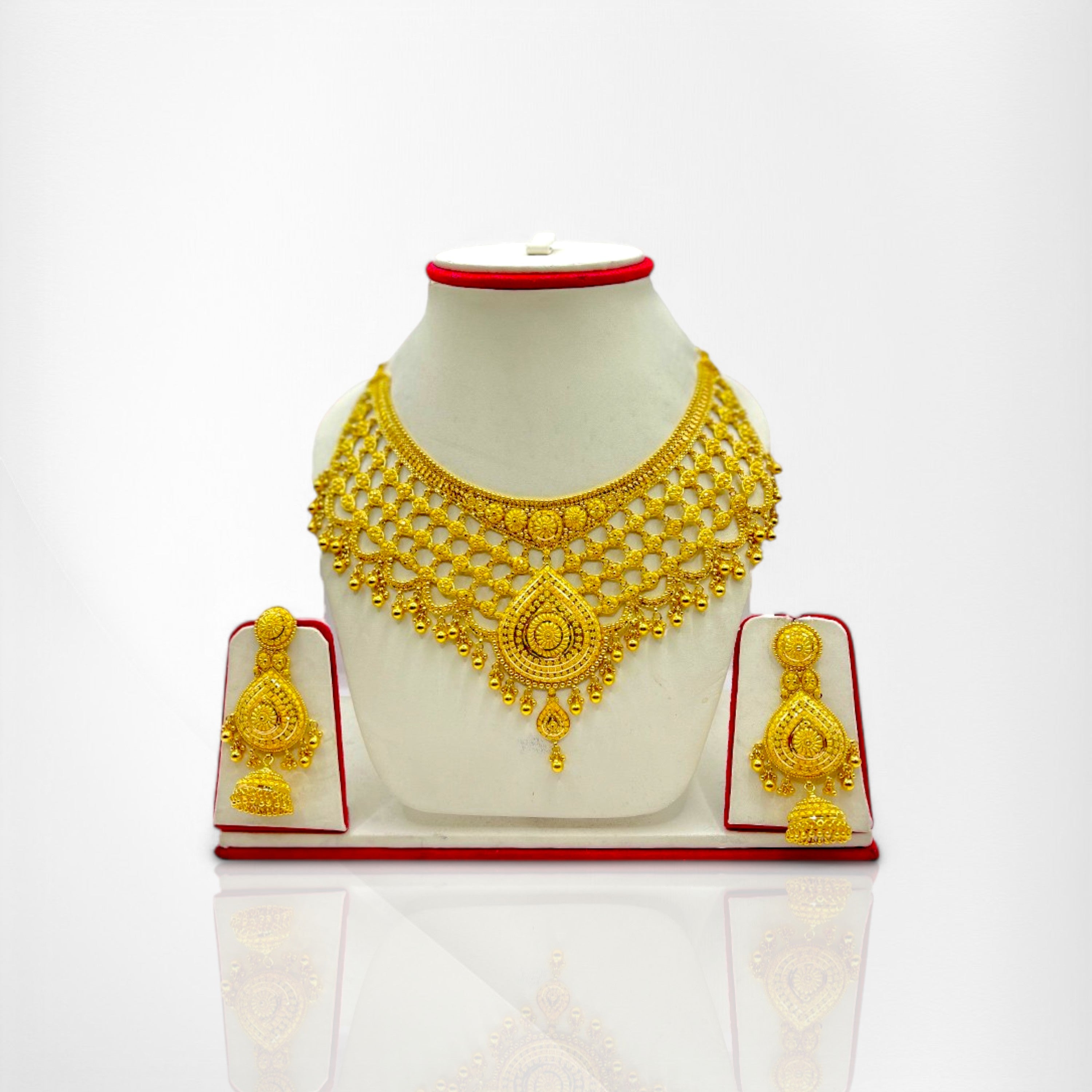 Regal Splendor: Intricately Designed Yellow Gold Necklace and Earring Set