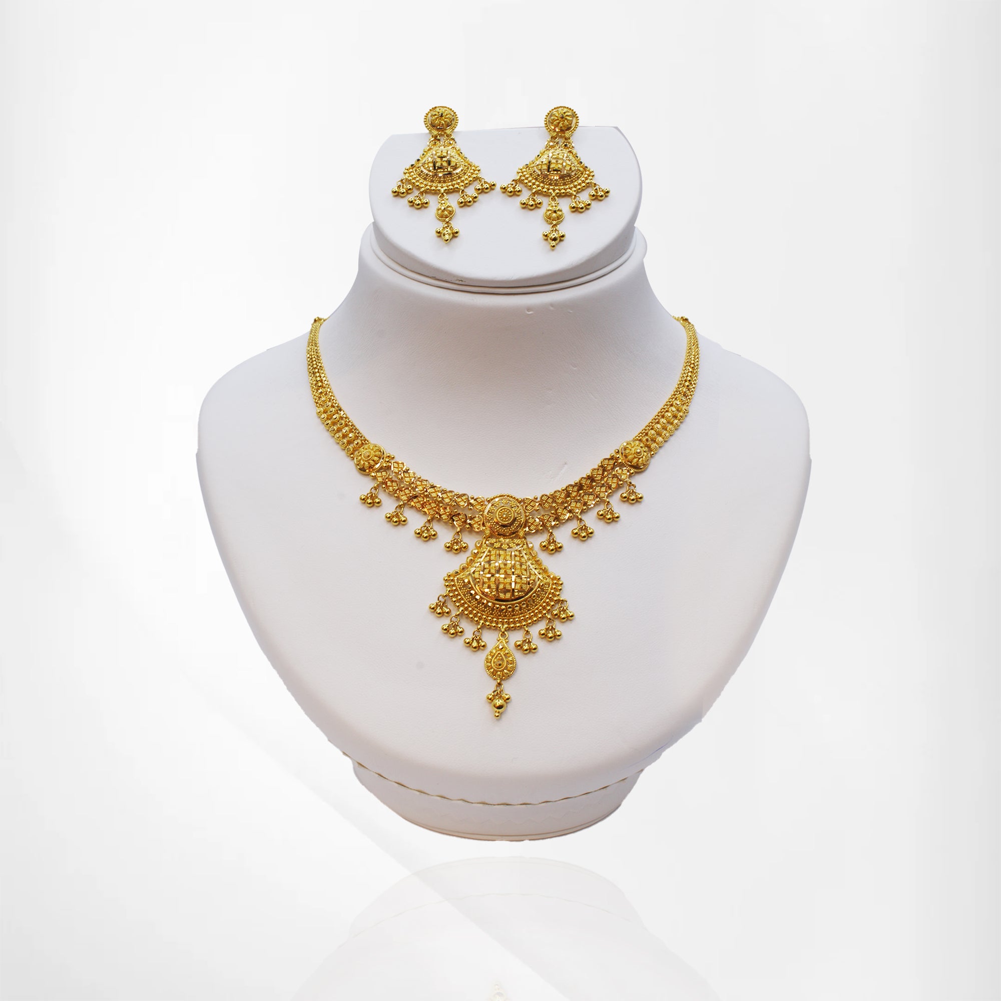 Intricately Crafted Yellow Gold Set with Earrings