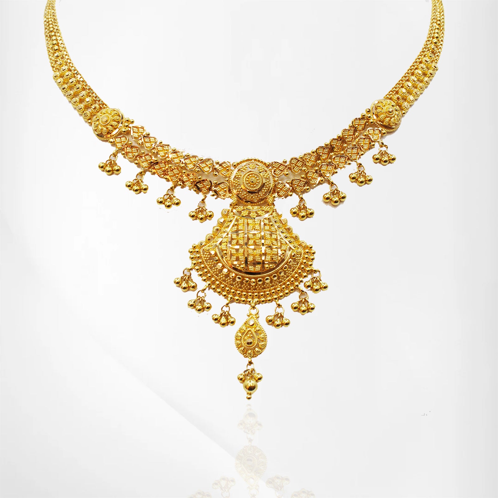Intricately Crafted Yellow Gold Set with Earrings