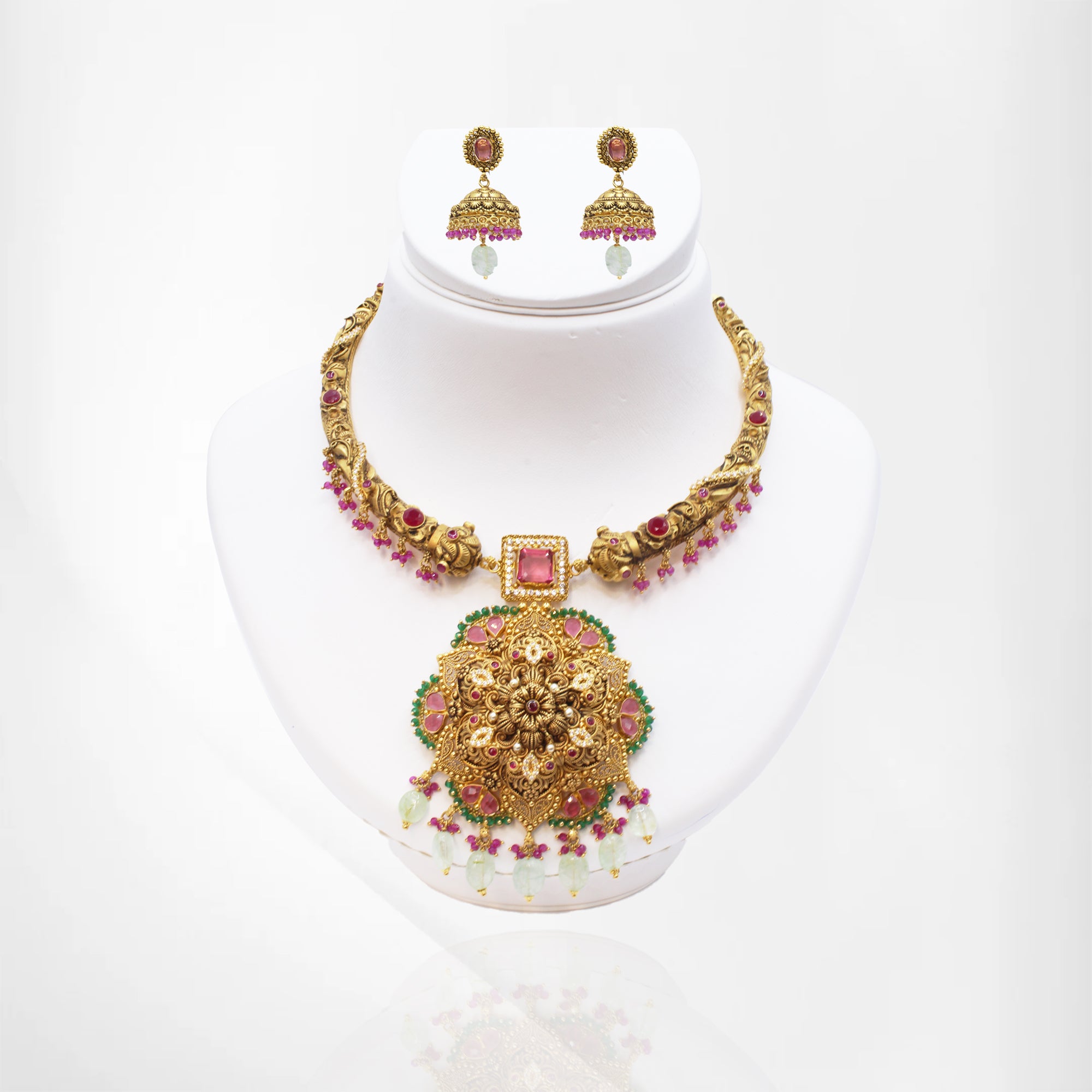 Traditional Hasli Necklace with Floral Pendant, Rose Quartz, and Butta-Style Earrings