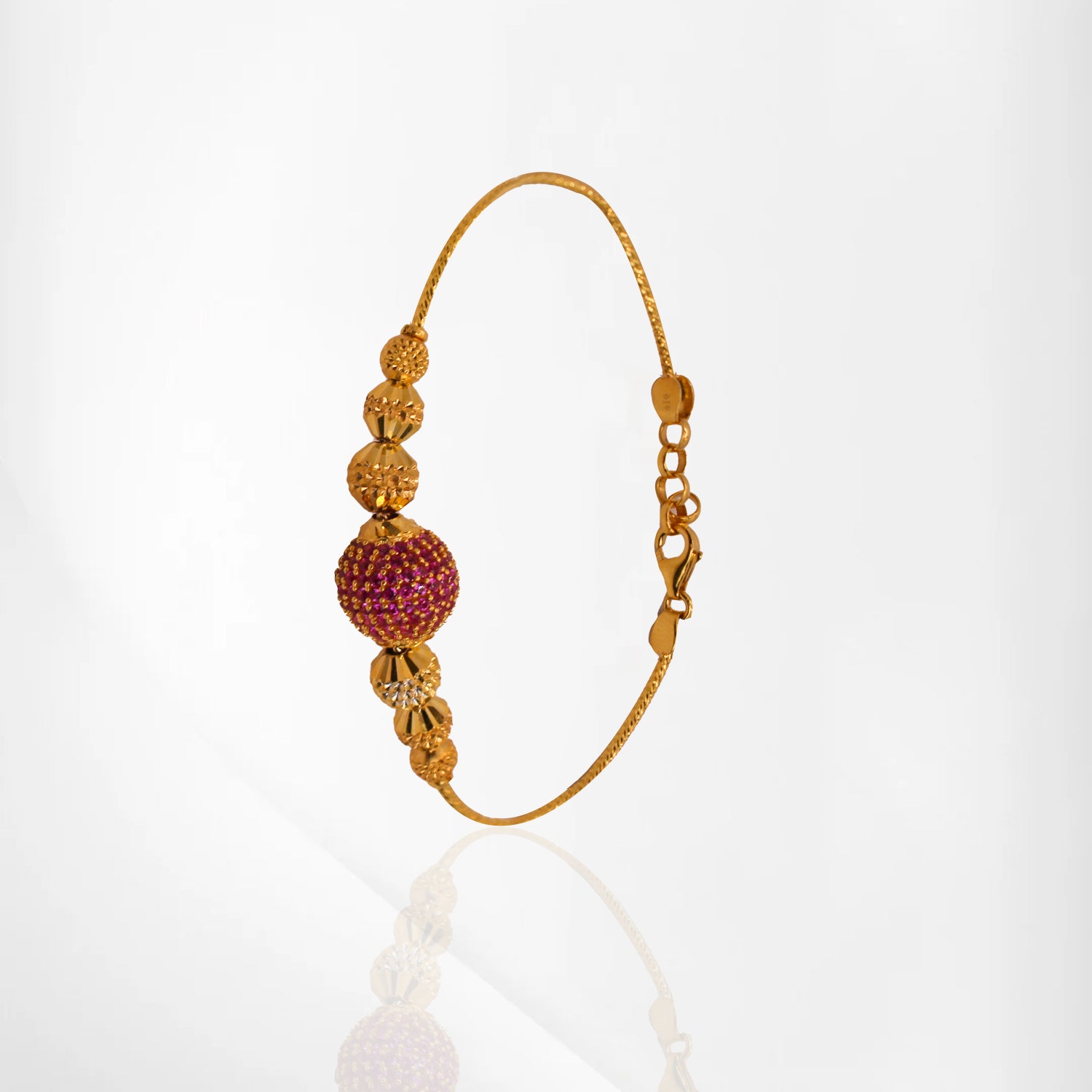 Ruby Glow Gold Bangle Bracelet