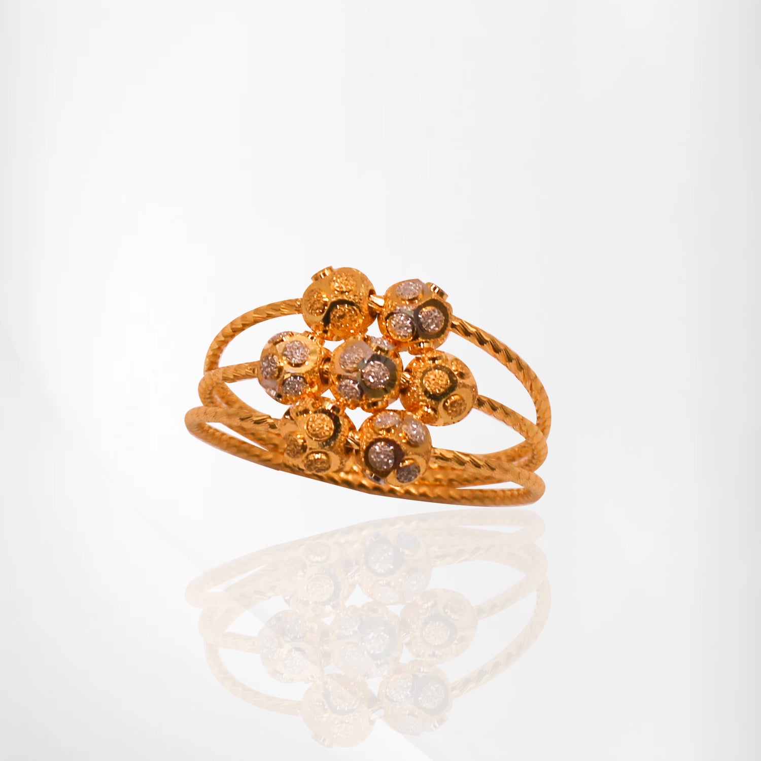 Elegant Gold Ring with Beaded Detail & Rhodium Polish
